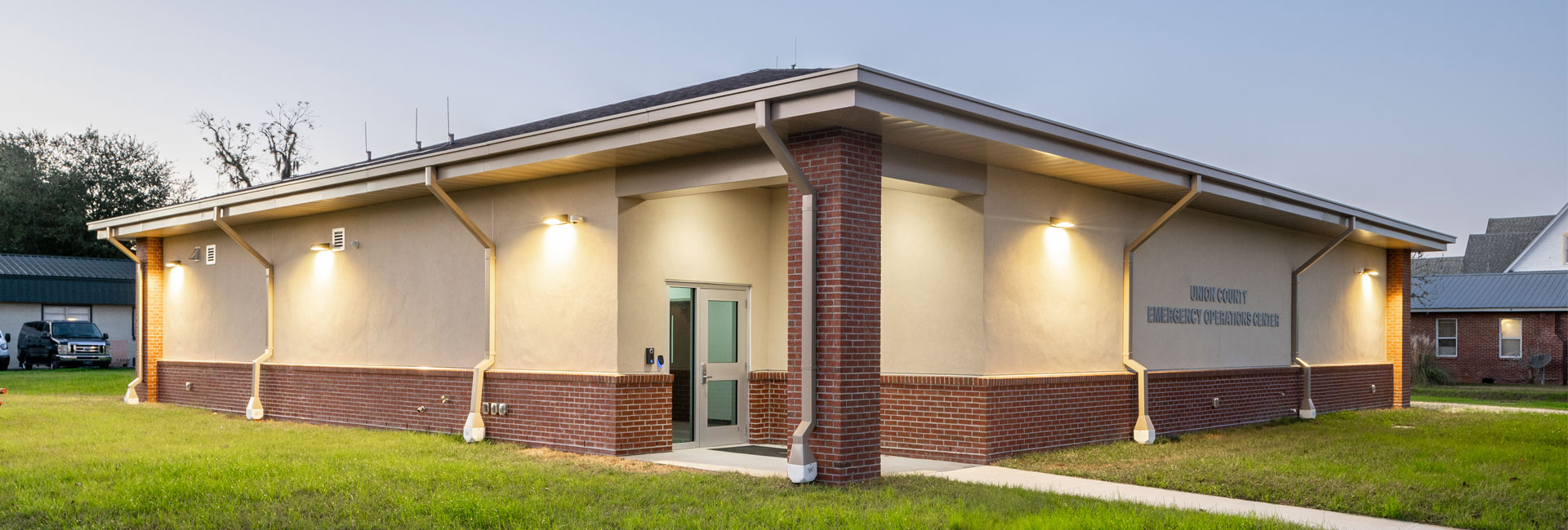 Exterior of the cream and brick Union County Emergency Operations Center built by Ajax Building Company.